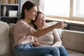 Smiling middle aged mother and daughter taking selfie together Royalty Free Stock Photo