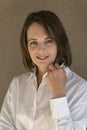 Smiling middle aged woman in white shirt. Business woman in formal clothes. Close up portrait Royalty Free Stock Photo