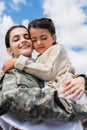 smiling military woman with closed eyes