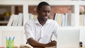 Happy black male student using apps study online on computer Royalty Free Stock Photo