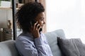 Happy African American woman talk on cellphone call Royalty Free Stock Photo