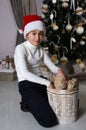 Smiling mischievous boy is taking out the brown teddy bear from Royalty Free Stock Photo