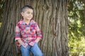 Smiling Mixed Race Young Boy Standing Outdoors. Royalty Free Stock Photo