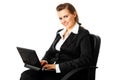 Smiling modern business woman using laptop Royalty Free Stock Photo