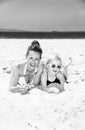 Smiling modern mother and daughter in swimsuit on seashore Royalty Free Stock Photo