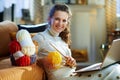 Smiling modern woman with yarn learn how to knit Royalty Free Stock Photo