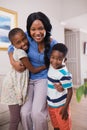 Smiling mother with children at home Royalty Free Stock Photo