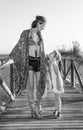 Smiling mother and daughter outdoors in summer evening walking Royalty Free Stock Photo