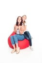 Mother and daughter on bean bag chair Royalty Free Stock Photo
