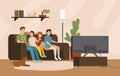 Smiling mother, father and children sitting on comfy sofa and watching television set. Happy family spending time