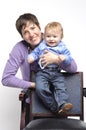 Smiling mother with funny baby Royalty Free Stock Photo