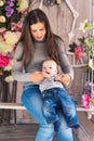 Smiling Mother Playing With Baby Son At Home Royalty Free Stock Photo