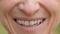 Smiling mouth of a middle-aged woman