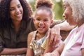 Smiling Multi-Generation Female Family At Home In Garden Together Royalty Free Stock Photo