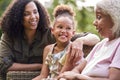 Smiling Multi-Generation Female Family At Home In Garden Together Royalty Free Stock Photo