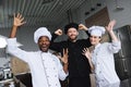 smiling multicultural chefs having fun