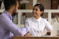 Smiling multiethnic businesspeople handshake getting acquainted at meeting Royalty Free Stock Photo