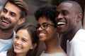 Smiling multiracial millennial friends posing for picture together Royalty Free Stock Photo