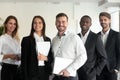 Smiling multiracial professional business team looking at camera, portrait Royalty Free Stock Photo