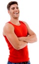 Smiling muscular man posing with crossed arms Royalty Free Stock Photo