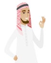 Smiling muslim businessman showing ok sign. Royalty Free Stock Photo