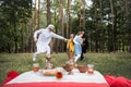 Smiling muslim family running near blurred Royalty Free Stock Photo