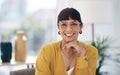 Smiling my way through my successes. Cropped portrait of an attractive young businesswoman sitting alone in her office Royalty Free Stock Photo