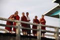 Smiling Myanmar monks on U-Bein bridge