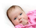 Smiling newborn baby girl