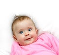 Smiling newborn baby girl