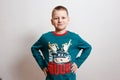 Smiling nine-year-old boy in green pajamas with a picture of cow. happy new year. year of the cow. Chinese New Year Royalty Free Stock Photo