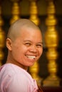 Smiling Nun of Shwedagon Pagoda, Yangon, Mynamar Royalty Free Stock Photo
