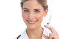 Smiling nurse holding syringe Royalty Free Stock Photo