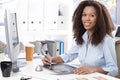 Smiling office worker with drawing table Royalty Free Stock Photo