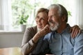 Smiling old couple hug dreaming of healthy future Royalty Free Stock Photo