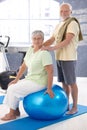 Smiling old couple relaxing after workout Royalty Free Stock Photo