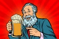 Smiling old man with a mug of beer foam