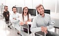 Smiling operators support in the workplace Royalty Free Stock Photo