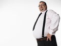 Smiling Overweight Businessman With Hand On Hip Royalty Free Stock Photo