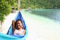 Smiling Papuan girl in tropical paradise