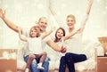 Smiling parents and two little girls at new home Royalty Free Stock Photo