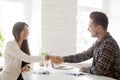 Smiling partners handshaking after successful work negotiations Royalty Free Stock Photo