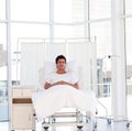 Smiling patient recovering in a hospital