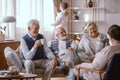 Smiling people talking together in nursing home Royalty Free Stock Photo