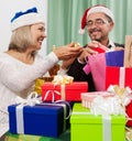 Smiling persons packed gifts Royalty Free Stock Photo