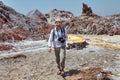 Smiling photographer traveler walks through the natural attractions, southern Iran.