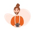 Smiling photographer. Young happy man with beard holding camera. Vector character in flat cartoon style Royalty Free Stock Photo