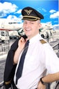 smiling pilot at the airport Royalty Free Stock Photo