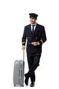 smiling pilot in uniform with luggage Royalty Free Stock Photo