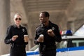 smiling police officers having coffee break Royalty Free Stock Photo